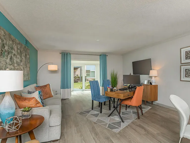 Experience modern comfort in this stylish living space, perfect for relaxation and work-from-home flexibility.