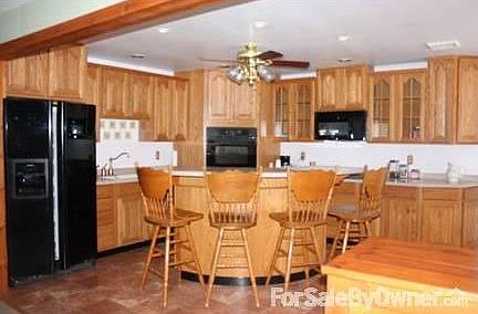 Kitchen
						:
						Eat in Kitchen with Center Island and Bar Chairs