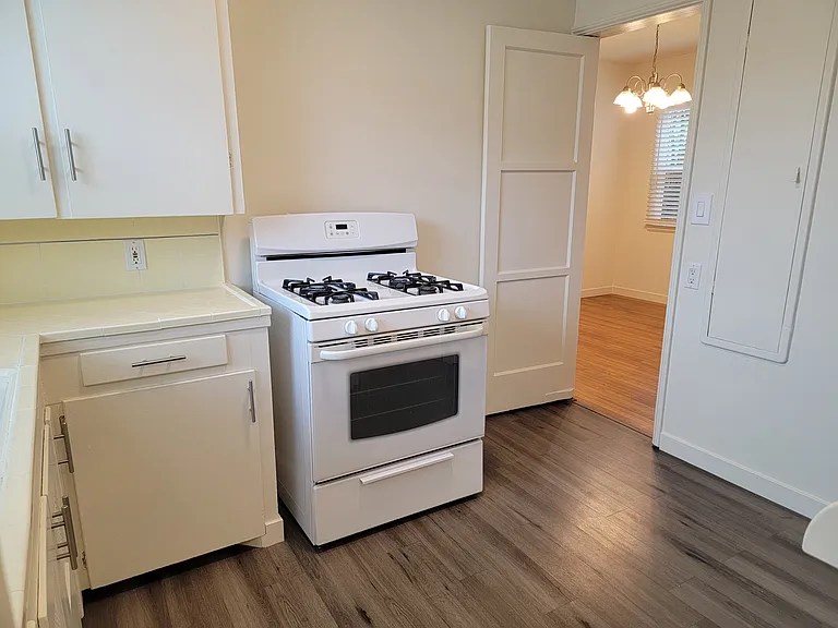 Kitchen with access door to Dining Room