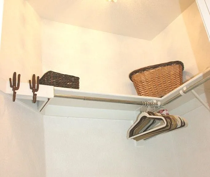 Walk in closet with elegant chandelier!