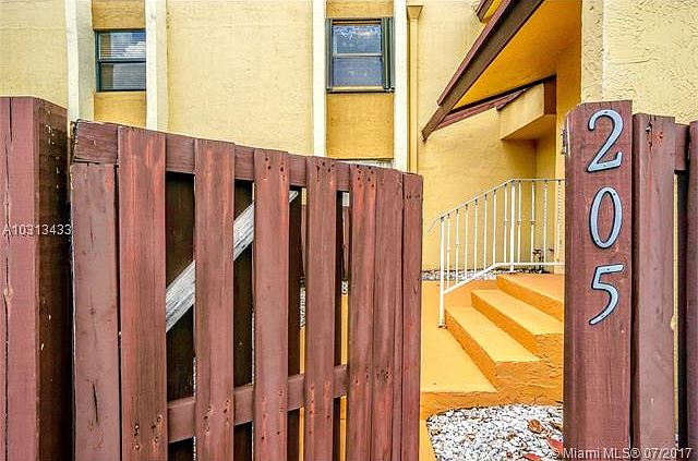 1st image of 9970 NW 9th St Cir #205-3
