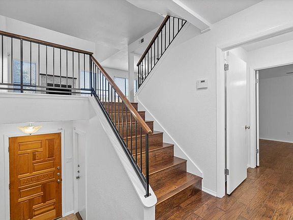 entry way leading into second bedroom and second full bathroom
