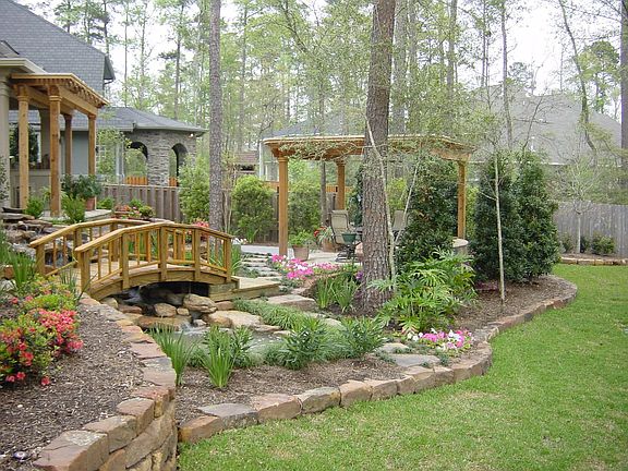 Waterfall and Koi Pond with bridge