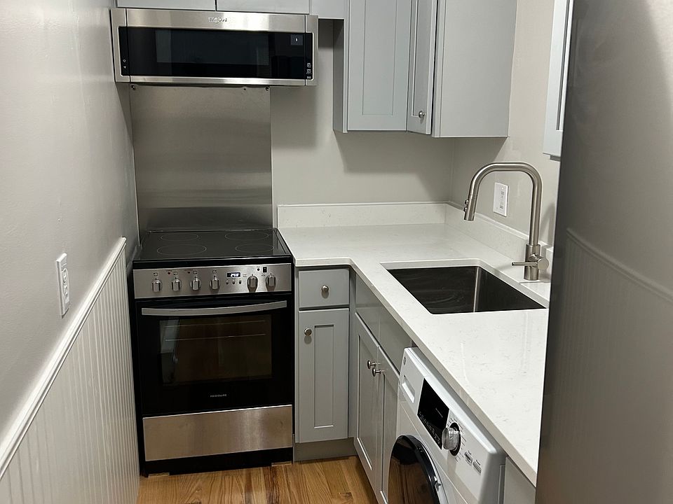 New kitchen cabinets, washer/dryer and quartz countertops