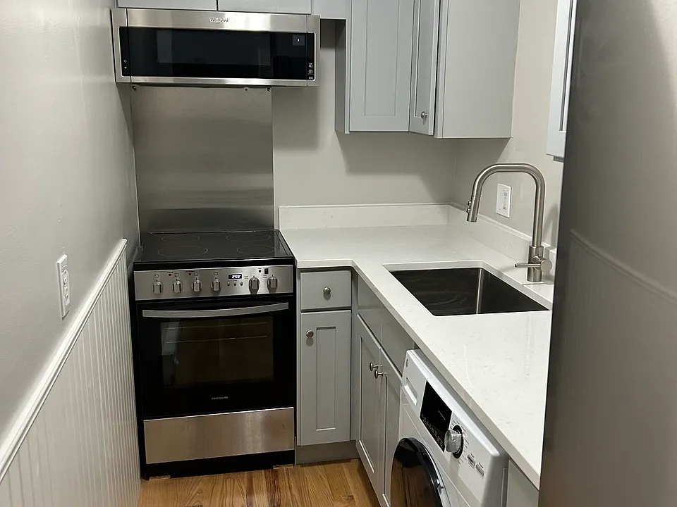 New kitchen cabinets, washer/dryer and quartz countertops