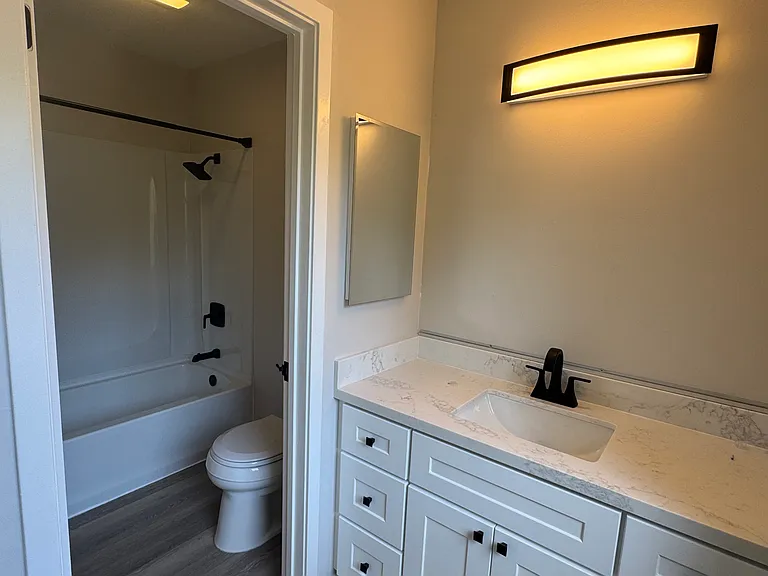 All new Tub/Shower combo and vanity. New mirror coming soon