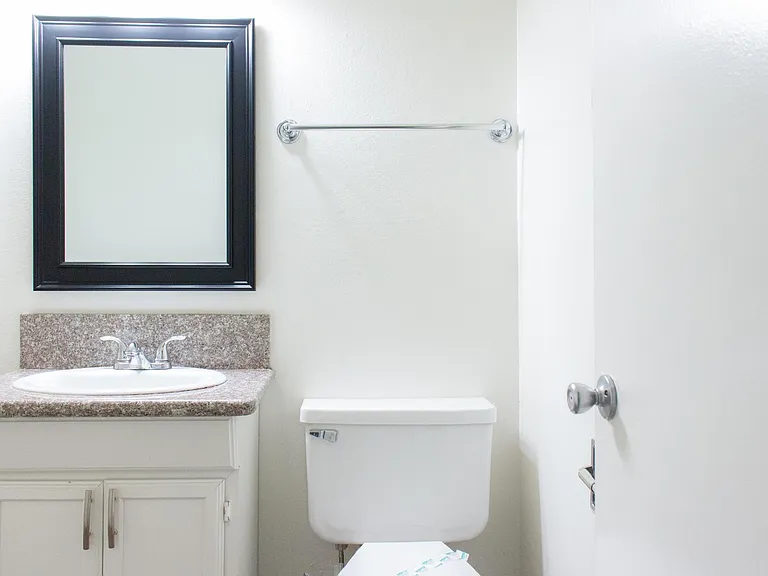 Split level Secondary bathroom with washer and dryer hookups (not shown). Use standard size machines as door opening measures approx. 27-28".
--
*Floor plans are digital renderings. All dimensions are approximate. Actual product and specifications may var