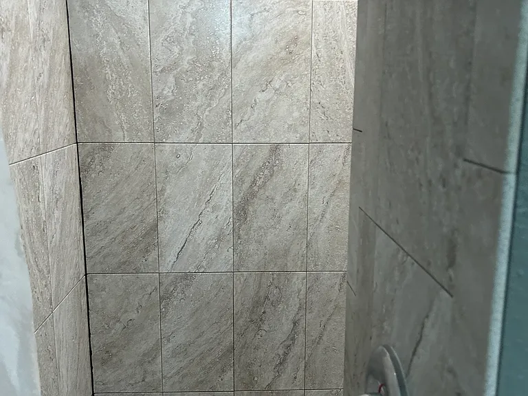 inside master shower large just turn the corner for privacy