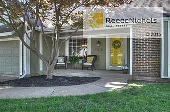 Nice front porch looking out on a beautiful green lawn by closing day