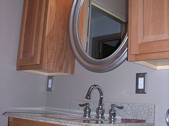 new sink and oak cabinets