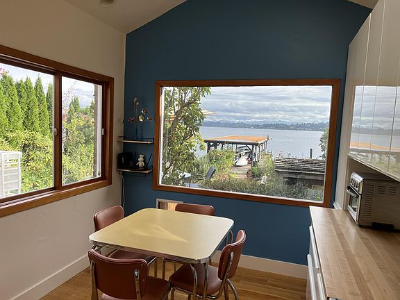 Newly remodeled kitchen with gorgeous view. Additional chairs/table available.
