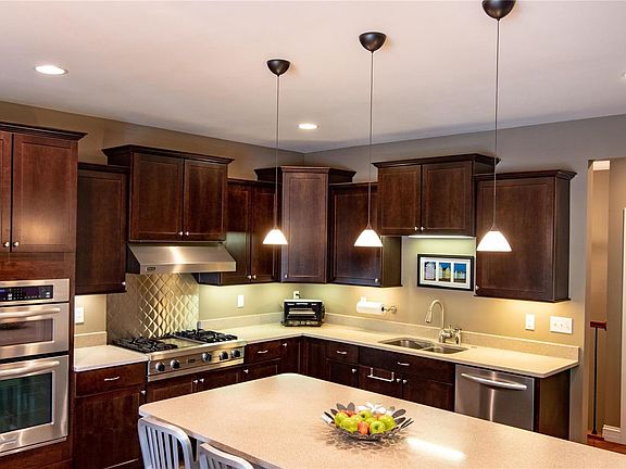 Large island with 3 pendant lights.