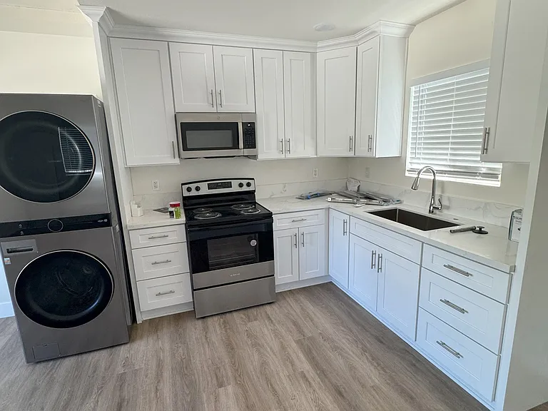 Bright kitchen with new appliances