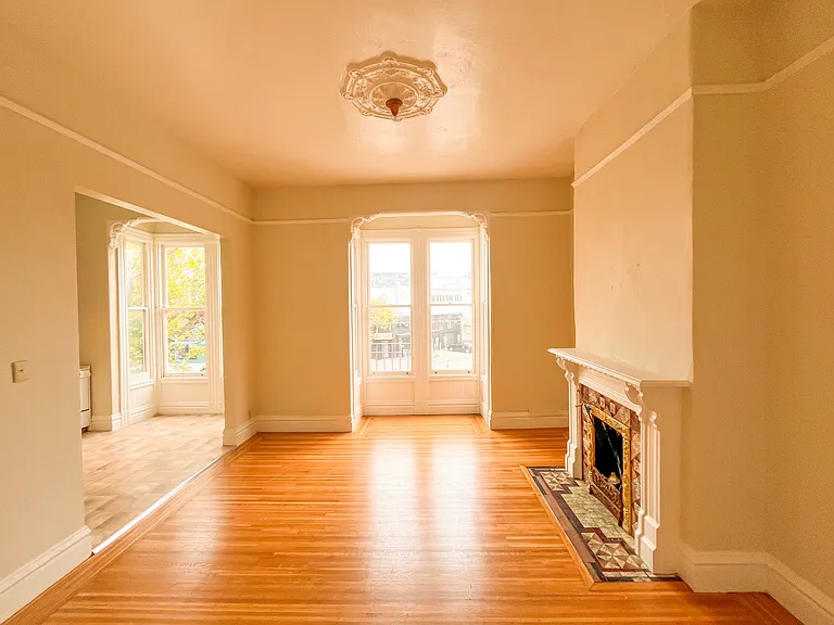 VIEW OF LIVING ROOM FROM BEDROOM