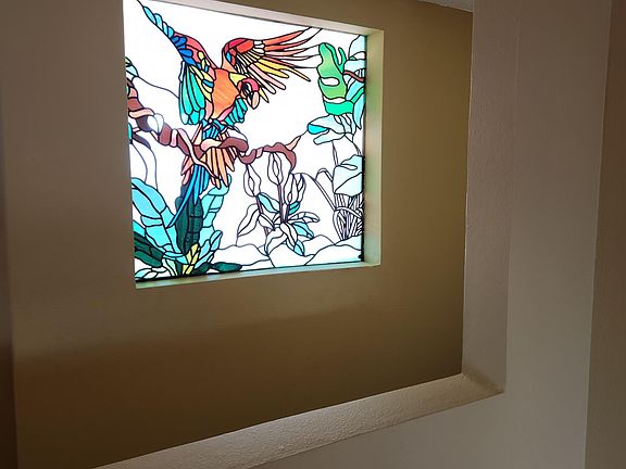 The fab retro stained-glass window lighting up your front hallway!