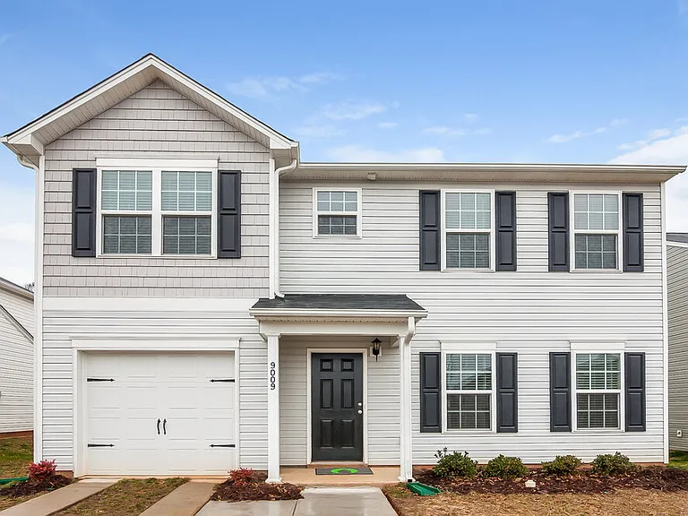 9009 Sharpes Cir — Photo 1