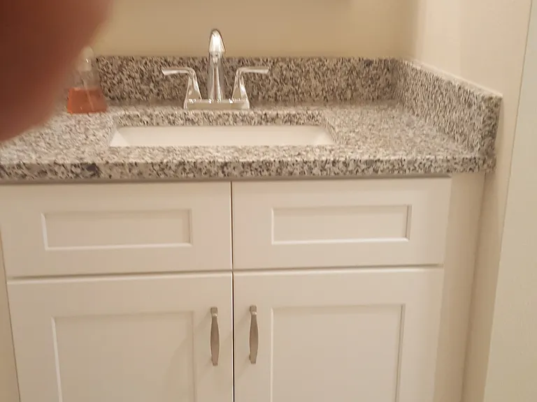Quiet close cabinets with granite countertops