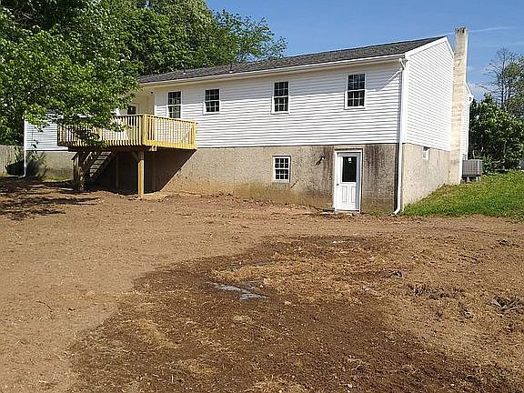 Back side of house with deck