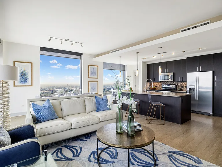 Floor to ceiling windows offer an abundance of natural light and awe-inspiring views
