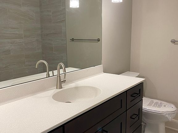 Full Bath with tiled floor and shower
