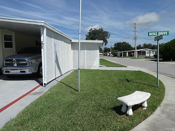 Side of home with other carport