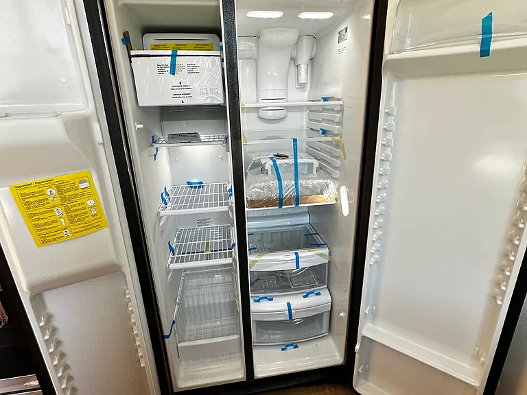 LOTS of Room, again before being unwrapped and set up with shelves and door racks