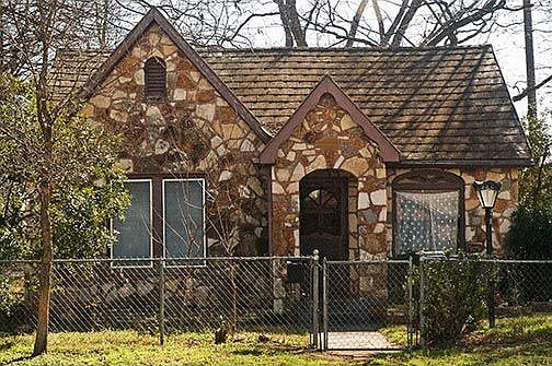 An artist's dream. Stone 2 bedroom home with den PLUS 4 room garage apt.