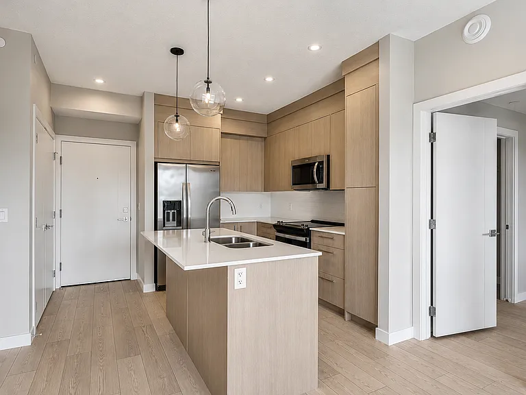 265 Wolf Willow Blvd SE #2415/2413 — Photo 4