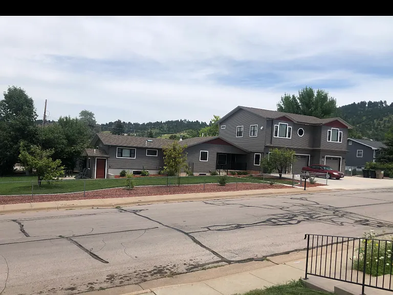 Picture of entire duplex in neighborhood