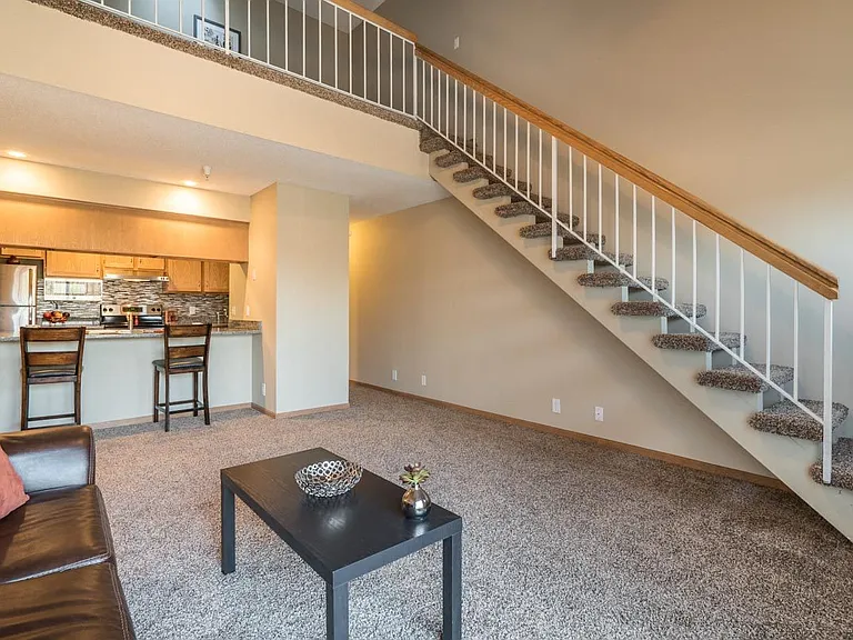 Enjoy the comfort of an open main floor with private bedrooms upstairs in our Stratosphere homes.