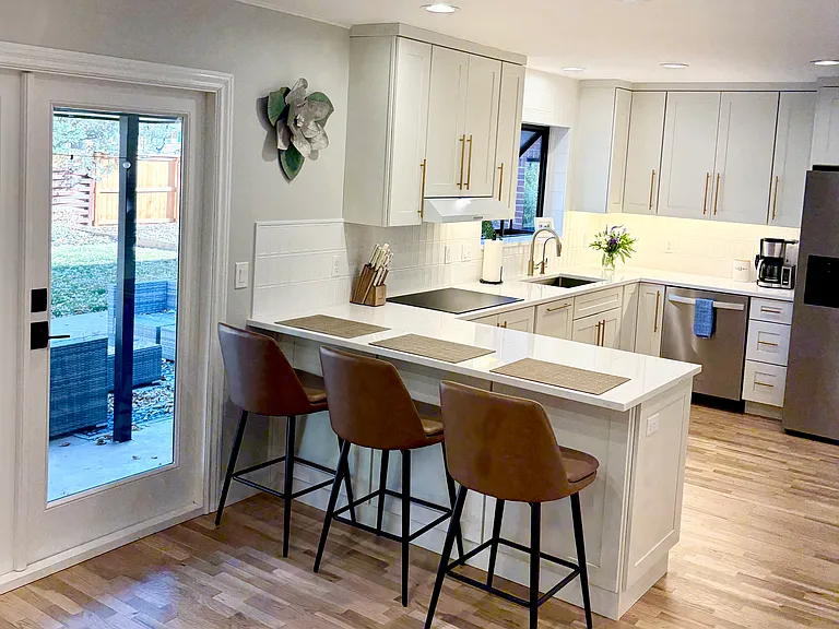 French doors both open to back yard and the BBQ grill