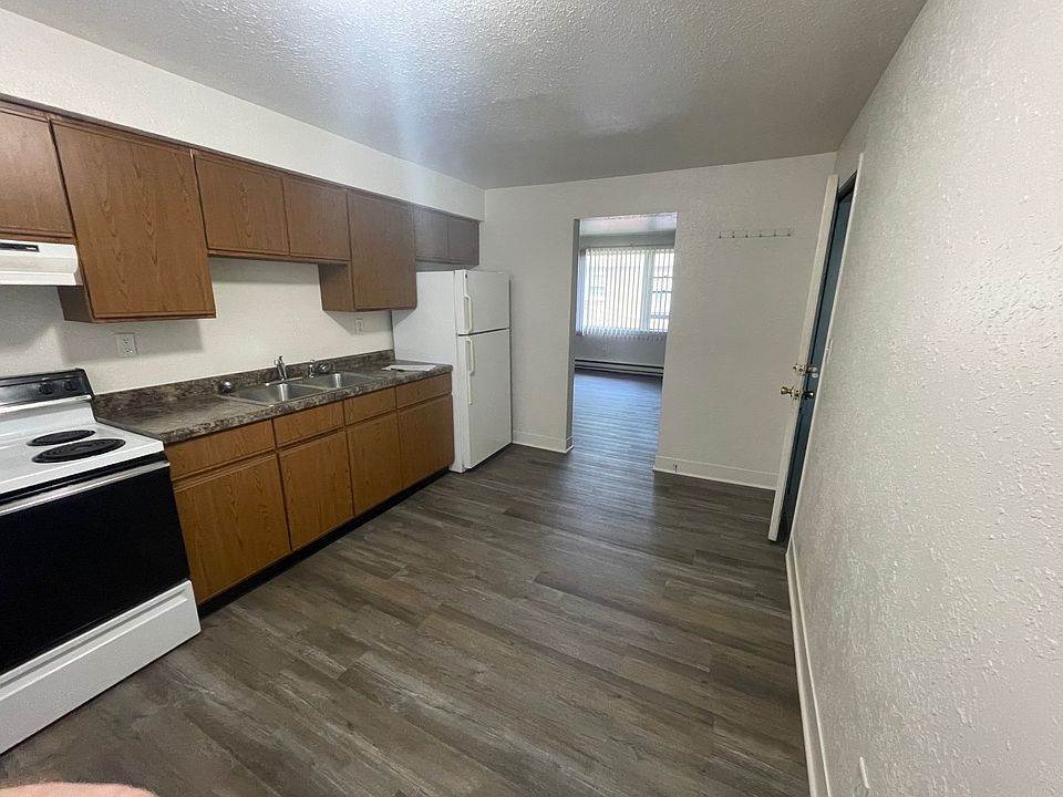 Kitchen into Living Room + Entry Door