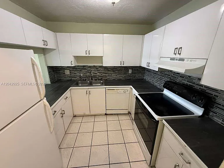 1900 W 68th St #G308 — Photo 1
