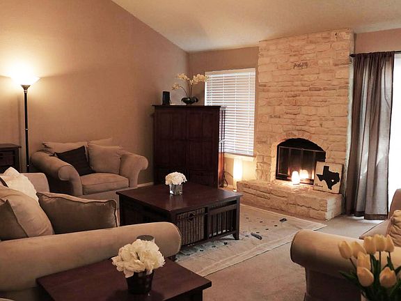 Oversized living room with charming gas fireplace!