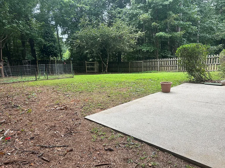 Back patio with plenty of sunlight for gardening