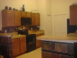 Fully equipped kitchen with pantry and laundry room