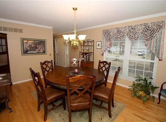 Large dining room with wood floors!