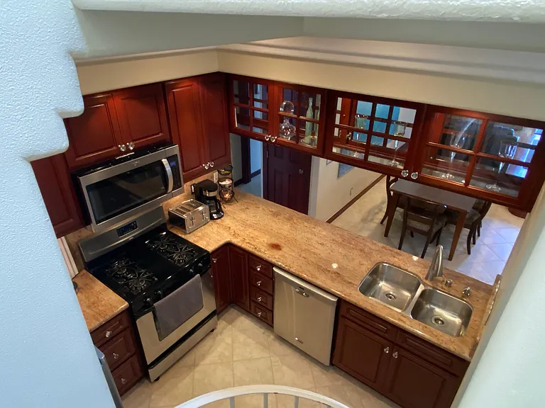 Gorgeous kitchen from spiral staircase