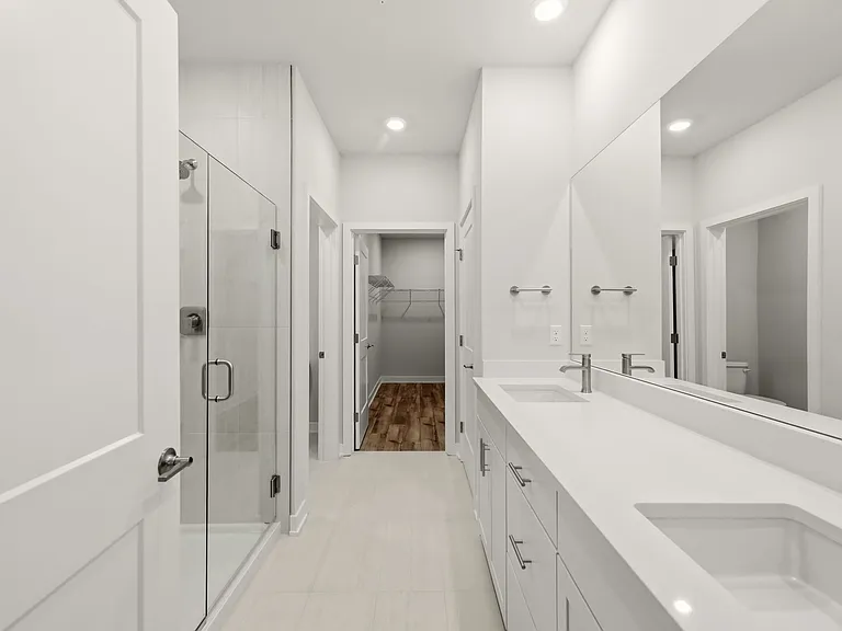 Master Bathroom with Quartz Countertops, Linen Closet and Large Walk In Closet