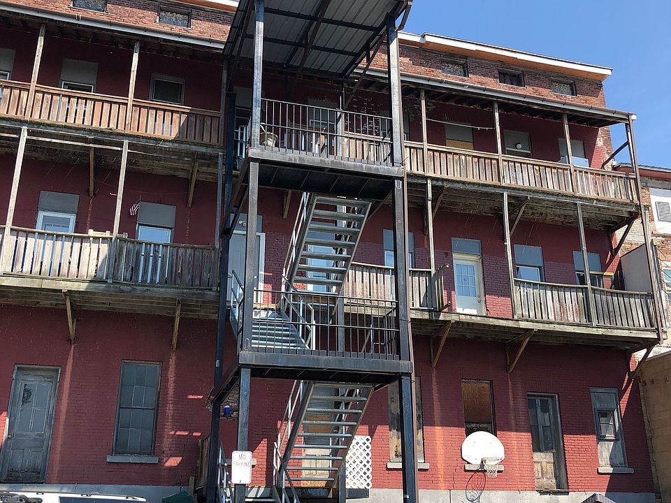 rear of the building with parking