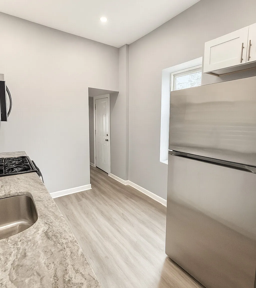 Newly Renovated 3-Bedroom Home with Modern Kitchen & Backyard — Photo 3