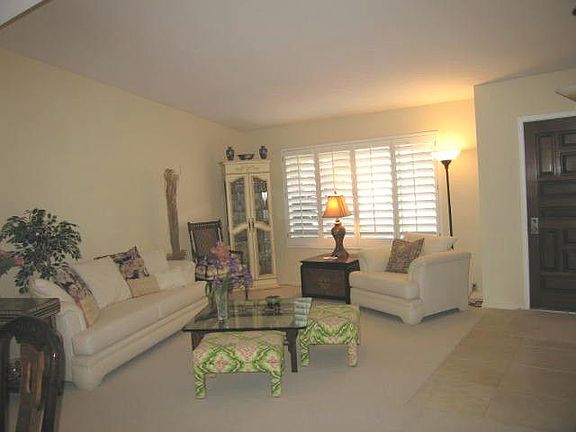 Large lving room has vaulted ceilings