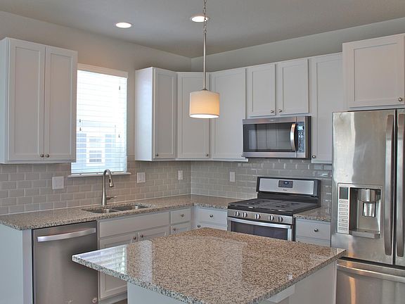 Large island and stove is 5 burner!