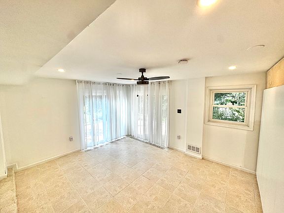 sunroom 1/2. (Bedroom photos available soon)