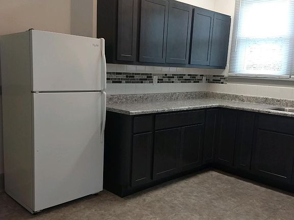 CHECK OUT THIS KITCHEN! NEW APPLIANCES. NEW CABINETS. NEW FLOORING. NEW WINDOWS. BE THE FIRST TO USE IT.