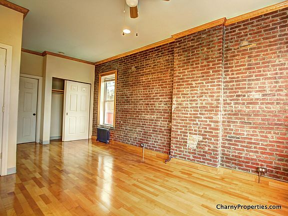 Exposed Brick Walls Throughout