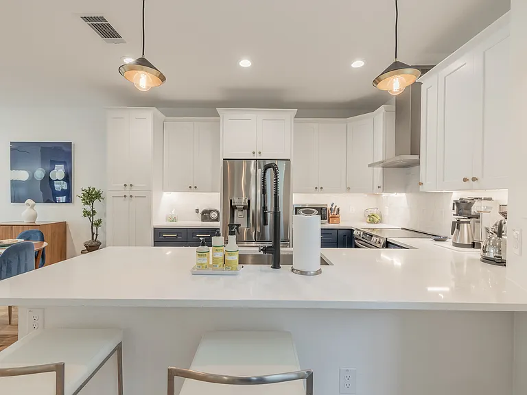 Kitchen with counter stools