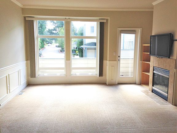 Large extended living room with generous natural light.