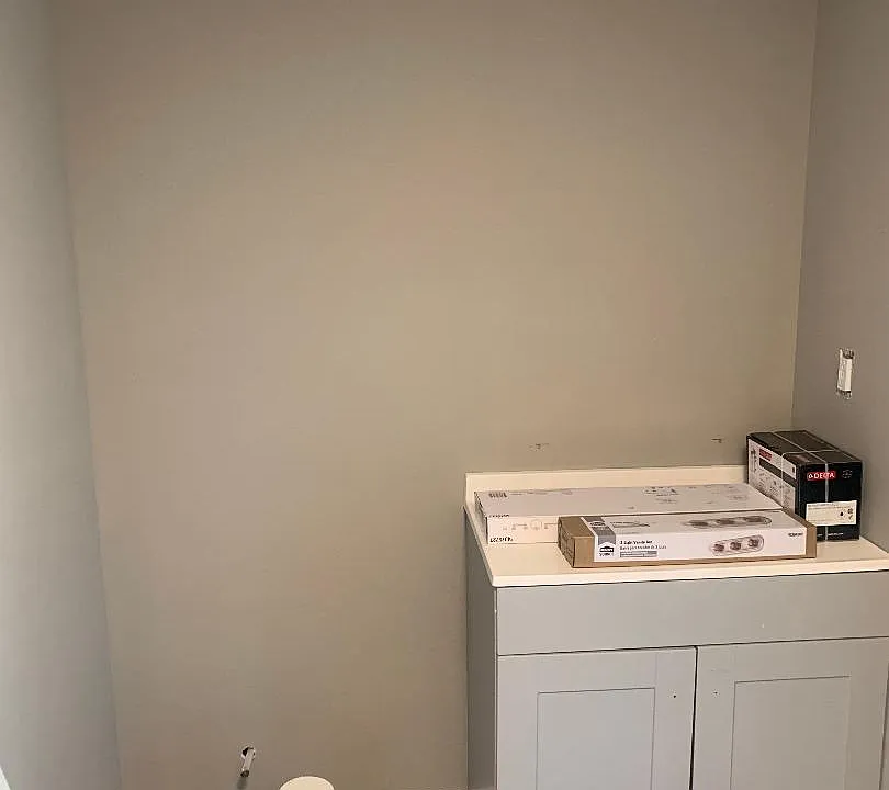 Half bath/laundry room off of kitchen