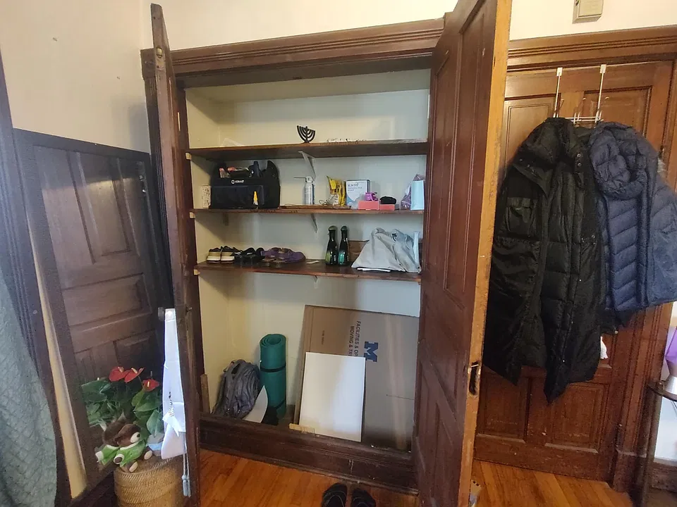 This is one of two closets in the apartment. The other is a fairly standard size for hanging clothes.